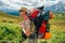 Hiker in the Mountains of Republic of Adygea with large backpacks. Russia