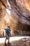 Hiker in The Narrows in Zion National Park