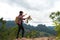 Hiker people woman feeling victorious facing and relax healthy on the mountain, Thailand.