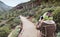 A Hiker Photographs the Lower Cliff Dwelling at Tonto National M