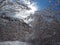 Hiker point of view. Closeup legs with snowshoes walking on snow surface. Snowshoeing on fresh snow