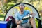 Hiker pouring water from thermos bottle