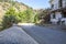 Hiker resting at abandoned village of La Cebadilla. Las Alpujar