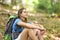 Hiker resting in a forest