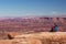 Hiker rests in Canyonlands National park in Utah, USA