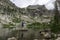 Hiker on rock at Amphitheater Lake