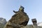 Hiker sits on a rock and enjoys the view