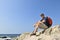 Hiker sitting on a rock