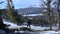 Hiker on snowy trail in Rocky Mountains