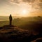 Hiker stand on the sharp corner of sandstone rock in rock empires park and watching over the misty and foggy morning valley to Sun