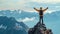 A hiker standing atop a mountain with arms raised in celebration