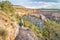 Hiker on a steep trail in Colorado National Monument