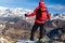 Hiker takes a rest admiring the mountain landscape. Monte Rosa M