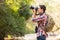 Hiker taking photos mountain