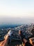 Hiker on a top of a mountain lions head