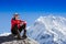 Hiker at the top of a rock enjoy sunny day