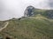 Hiker on a trail in Bucegi Mountains on their way to Omu peak