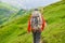 Hiker traveling in Alps. Alpine peaks landskape background. Jungfrau, Bernese highland. Sport, tourism and hiking