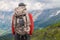 Hiker traveling in Alps. Alpine peaks landskape background. Jungfrau, Bernese highland. Sport, tourism and hiking