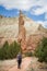 Hiker viewing Ballerina Spire, Kodachrome Basin, Utah, USA