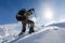 Hiker walking in winter Carpathian mountains