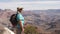 Hiker Walks To The Edge Of Grand Canyon And Admires The Beautiful Landscape