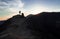 Hiker Watches Sunrise over Mount Bromo, Java, Indonesia