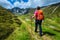 Hiker woman with backpack in Bucegi mountains, Carpathians,Transylvania, Romania