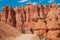 Hiker woman in Bryce Canyon hiking looking and enjoying view during her hike wearing hikers backpack.