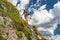 Hiker woman on hiking trail under hill Ohniste  in Low Tatras mountains, Slovakia