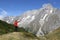 Hiker woman pointing the Grand Jorasses