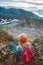 Hiker woman relaxing in mountains of Norway travel hiking outdoor adventure healthy lifestyle