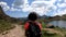 Hiker woman walking on the path on the Pyrenees mountains