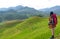 Hiker women in the mountains with backpack near rice