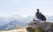 Hiker, young woman with backpack enjoying a view