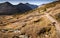 Hikers adventuring in the Canadian Rockies during the fall