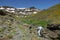 Hikers ascending mountain panorama