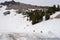 Hikers begin their ascent to Lassen Peak trail, despite the hiking trail being covered in