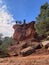 Hikers on cliff at Slide Rock State Park