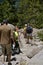 Hikers descend a mountain path