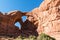 Hikers at Double Arch