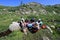 Hikers enjoy clear sunny summer afternoon by King Lake, Colorado.