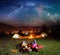 Hikers enjoying the bright stars and lying on the grass