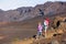 Hikers enjoying walk on amazing mountain trail