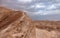 Hikers on a hiking trail in the remote part of the Judean Desert, Israel