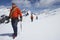 Hikers Joined By Safety Line On Snowy Mountains