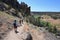 Hikers on Misery Ridge Trail in Smith Rock State Park, Oregon.