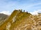 Hikers on Museteica Ridge, Fagaras Mountains, Romania