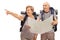 Hikers pointing at a landmark and holding a map