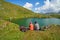 Hikers resting by a lake